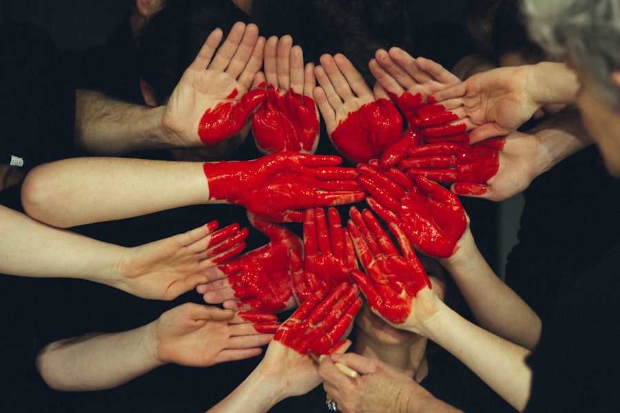 Many hands joined together in a community